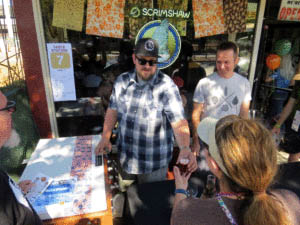 Photo by Marty Cheek Morgan Hill resident Jon Berkland, left, and Gilroy resident John Phelan pour their homemade beer to people during last month's Brew Crawl hosted by the Morgan Hill Downtown Association.